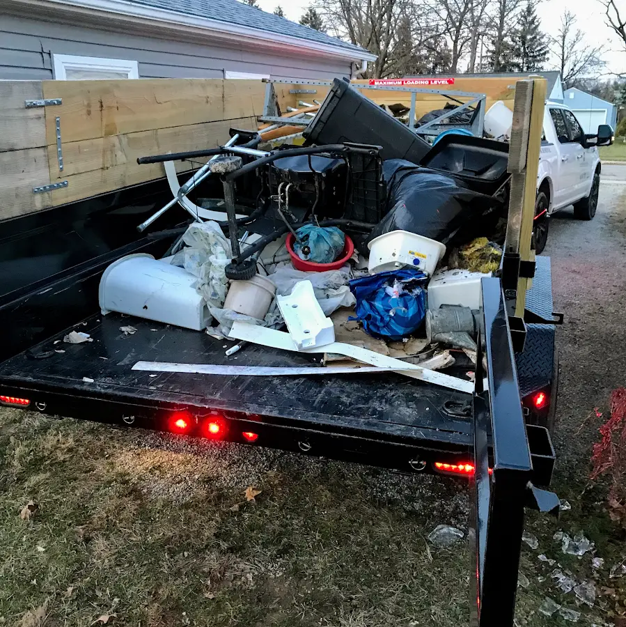 Roll-off dumpster delivered to a residential driveway in Livonia