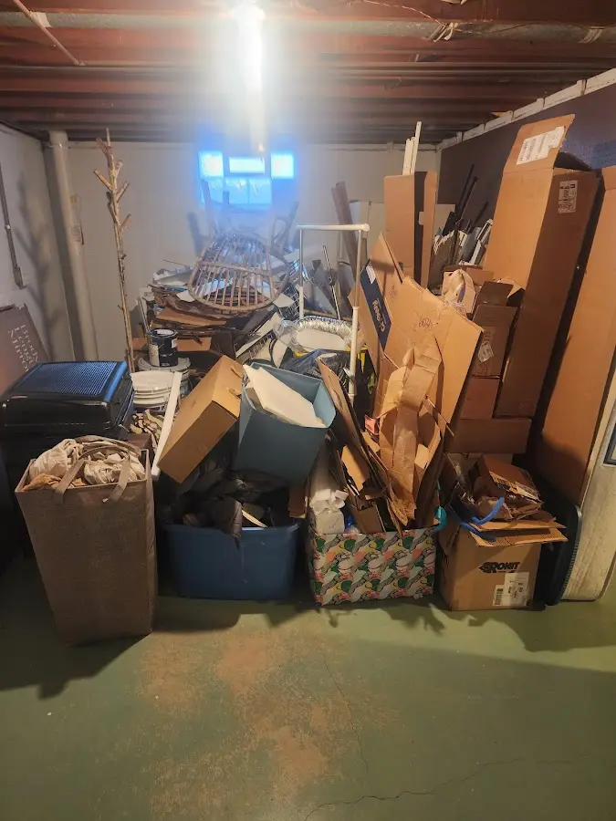 Roll-off dumpster container at job site for 15 Yard Dumpster Rental in Livonia